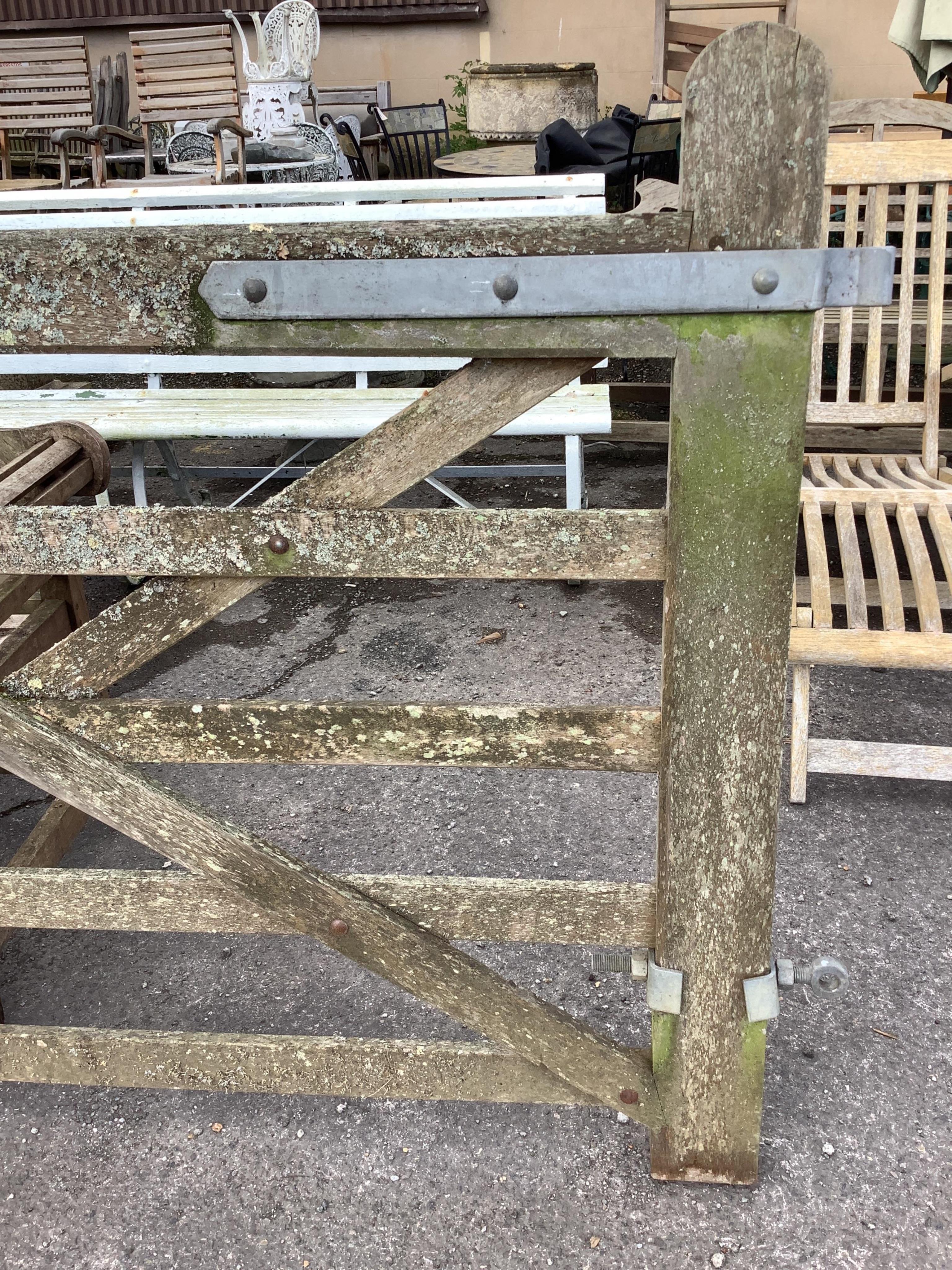 A pair of 10ft Biddenden hardwood gates with galvanised mounts. Condition - fair